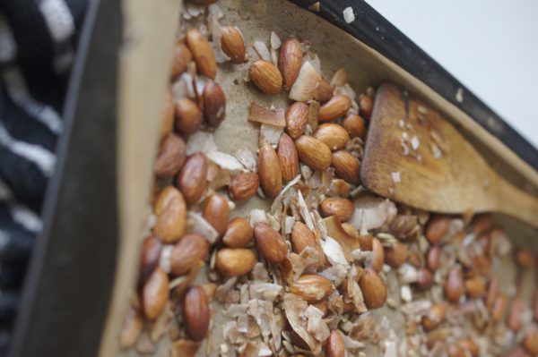 Paleo Granola Paleo Granola on cookie sheet with parchment paper
